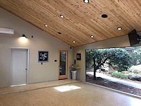 Our ColorFlake floor treatment helps transform this garage into additional living space
